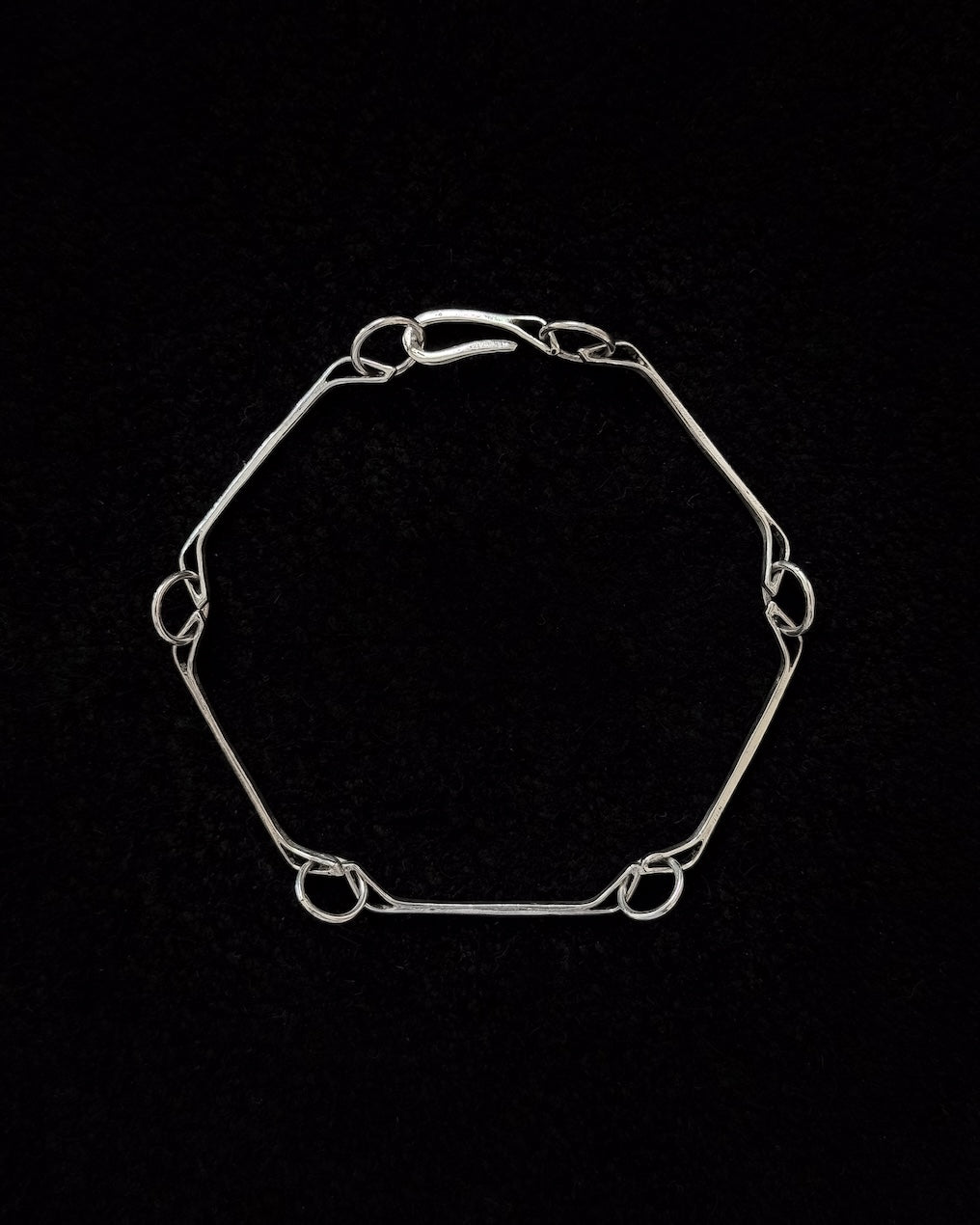 Minimalist 925 sterling silver bracelet inspired by the jawbone of a horse